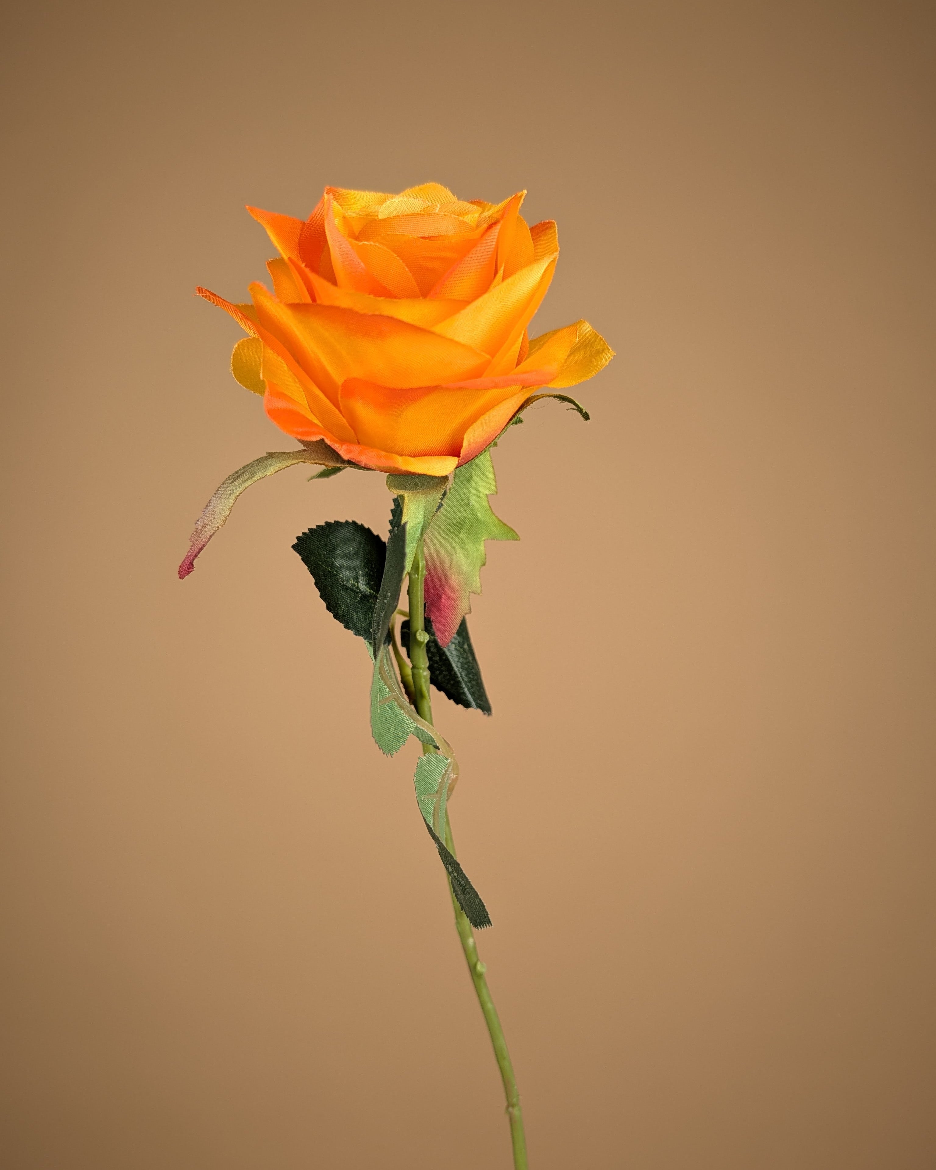 Zijde roos warm geel oranje
