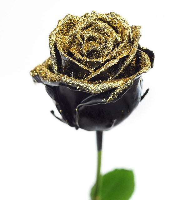 Bouquet of large -flowered wax roses black with golden glitter