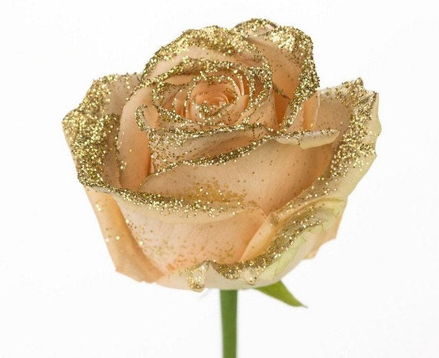 Bouquet of large -flowered Peach roses with golden glitter