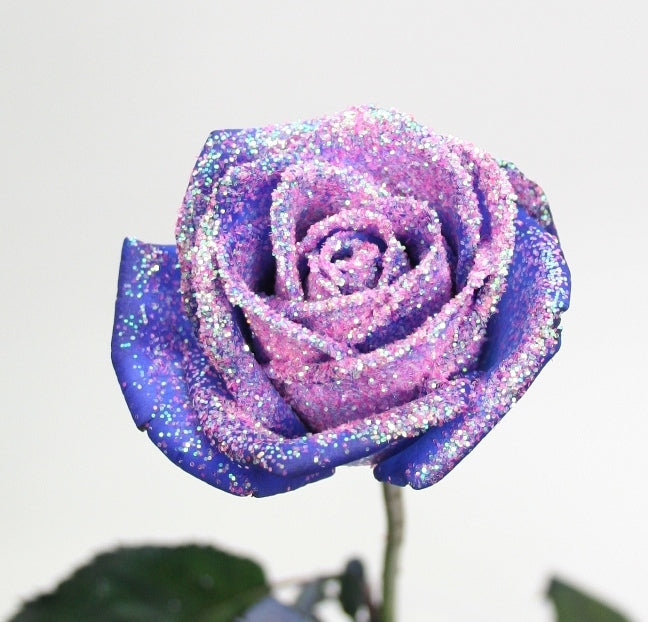 Bouquet of blue roses with pink glitter