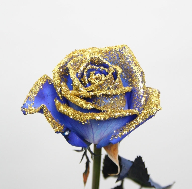 Bouquet of blue roses with golden glitter