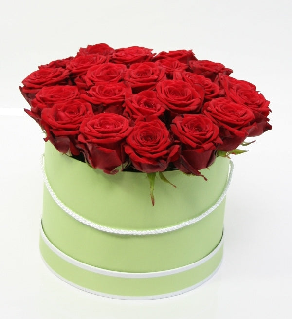 Red roses in a lime green box